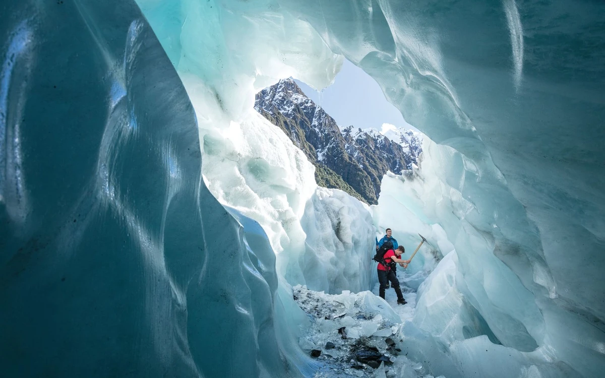 A guided group in crampons on the ice at Franz Josef Glacier