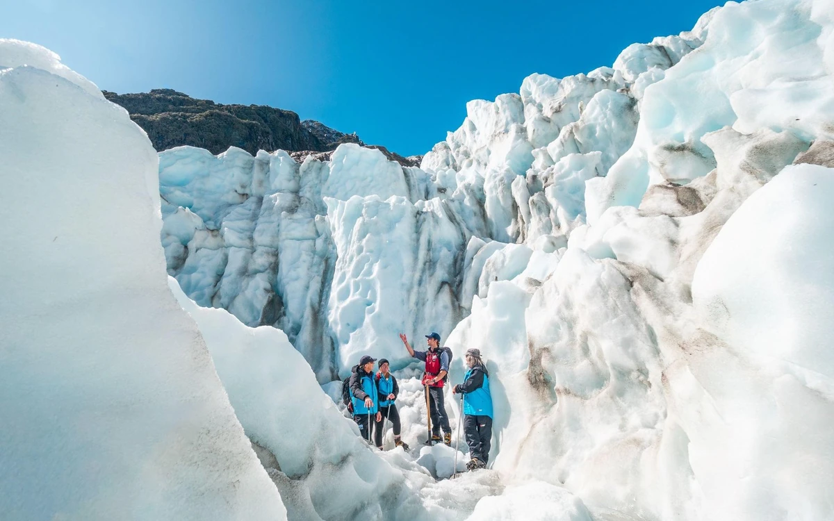 Crampons fitted for a guided walk on the glacier ice