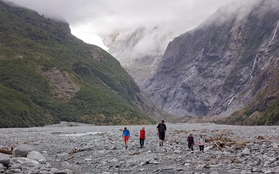 A guided group on the rainforest trail in the Franz Josef Glacier valley