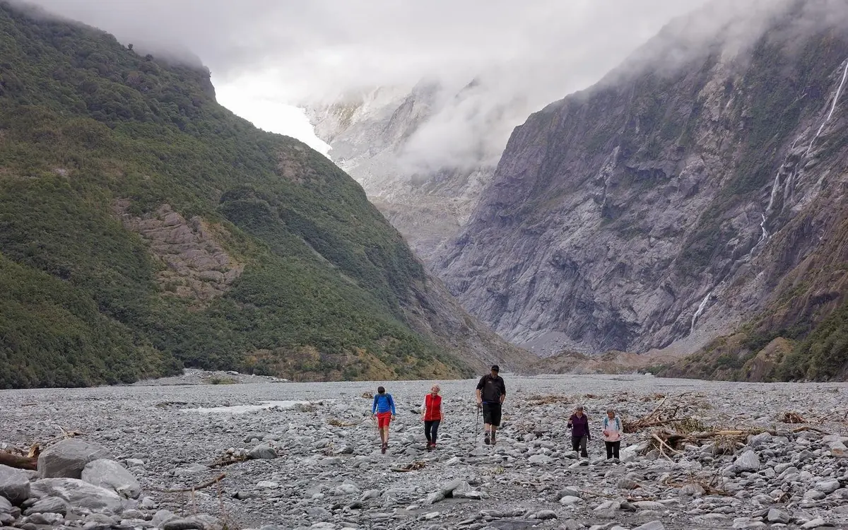 Walkers on the rainforest track in the Franz Josef Glacier valley